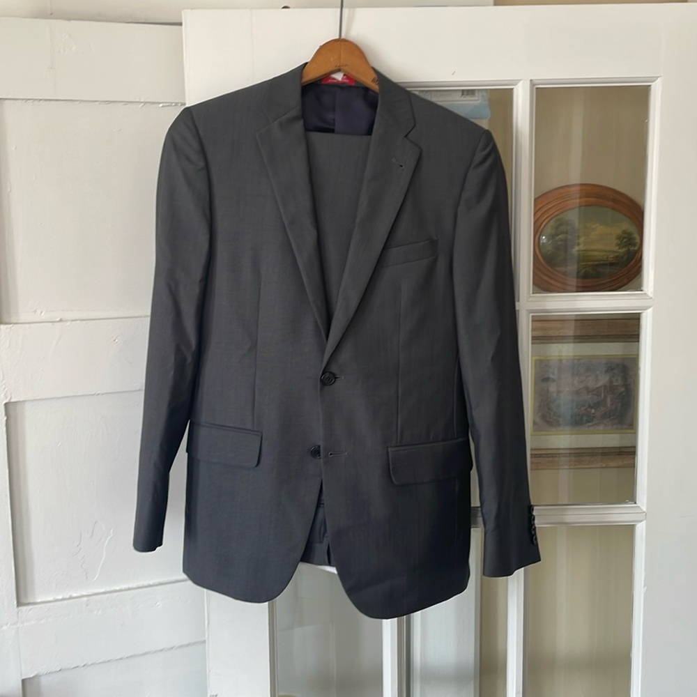 100 Percent Wool Suit 

Label states- Ermenegildo Zegna Cloth